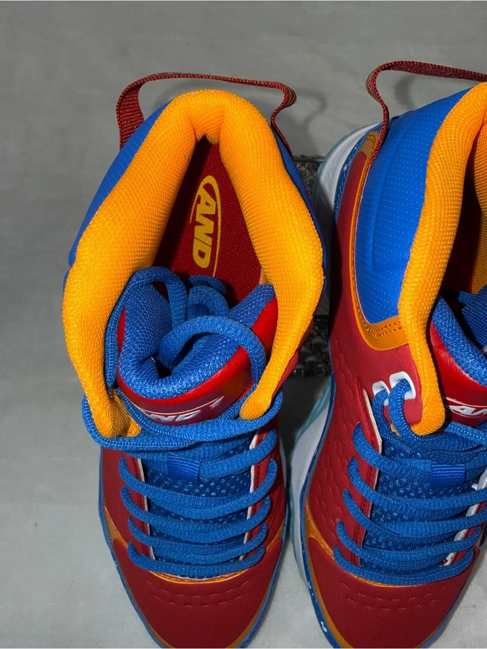 Mens 8.5 or women’s 10, AND1 Red, Blue, White, & Orange, Basketball Shoes.